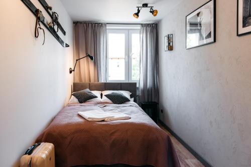 Katil atau katil-katil dalam bilik di Szara Strefa - Loft Bieszczady Apartament