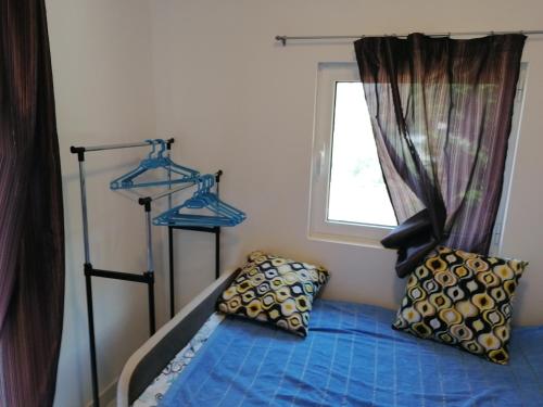 Кровать или кровати в номере Apartman Marinkovic