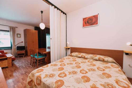 Postel nebo postele na pokoji v ubytování Sky Residence - Comfort Apartments in Aprica