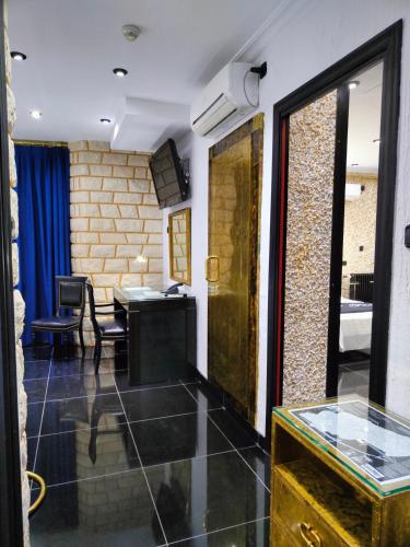 a living room with a table and a window at Hotel Plata in Ibi