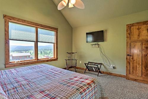 a bedroom with a bed and a tv and a window at Sturgis Home with Private Hot Tub Golf and Hike! in Sturgis