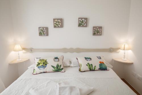 Relais Trulli Le Iconeにあるベッド