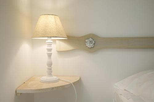 Relais Trulli Le Iconeにあるベッド