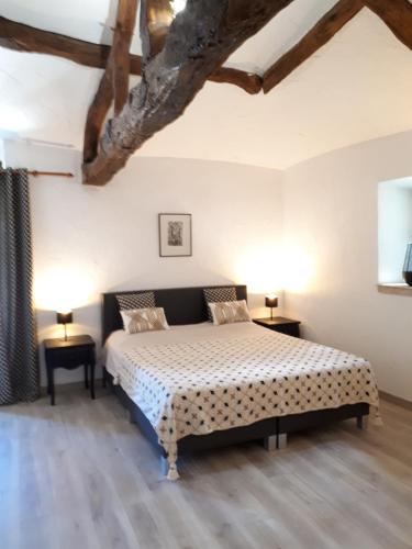 Katil atau katil-katil dalam bilik di Domaine de Merugat Chambre d'Hôtes