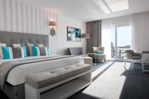 Postel nebo postele na pokoji v ubytování Hotel Juliani - Boutique Hotel