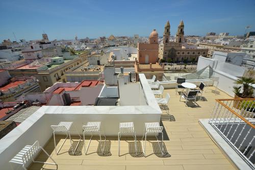 a view of a city from the roof of a building at Plaza Mina Suites - Adults Recommended by Luxury Suites Cadiz in Cádiz