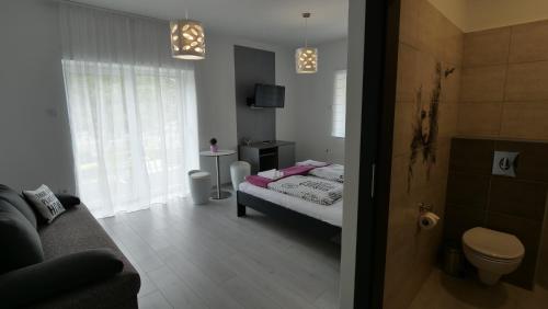 Posteľ alebo postele v izbe v ubytovaní Anna Villa Füred Boutique Rooms