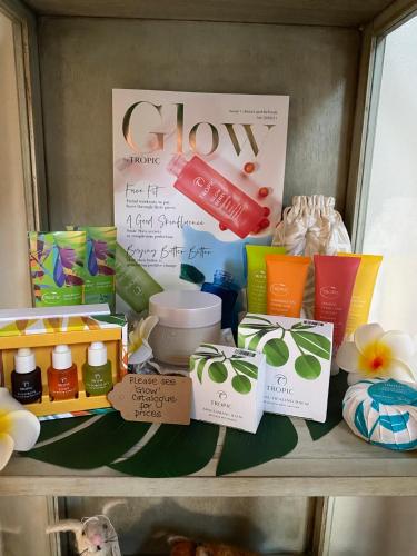a shelf with a bunch of different products on it at Rew Farm Country & Equestrian Accommodation - Sunrise Lodge in Melksham
