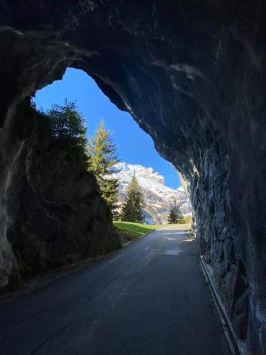 a road inside of a cave in a mountain at Jupi Hüsli in Göschenen