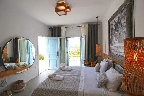 Postel nebo postele na pokoji v ubytování Harmony Boutique Hotel