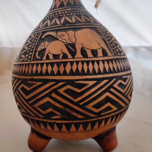 a vase with two elephants painted on it at Under Canvas Bornholm in Østermarie