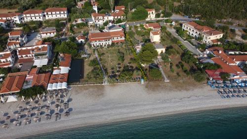 an aerial view of a resort on a beach at Pelagos Beachfront in Panormos Skopelos
