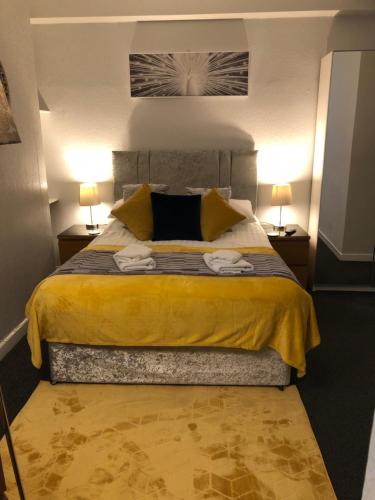 Säng eller sängar i ett rum på The Georgian Guesthouse