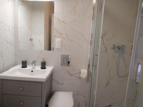 Kúpeľňa v ubytovaní Nowe Apartamenty na Gryfa