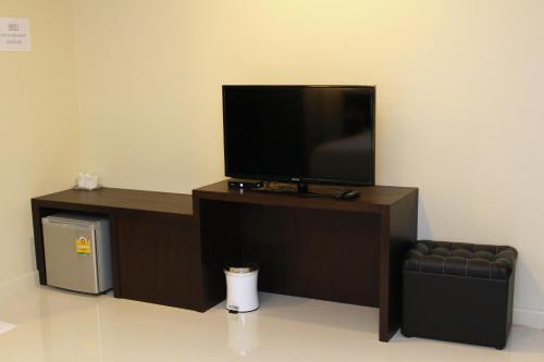 TV a/nebo společenská místnost v ubytování Chiangrai Green Park Resort