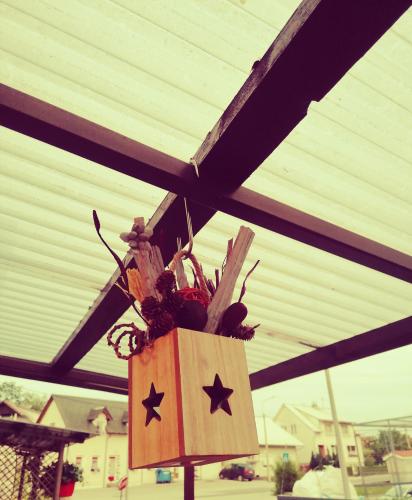 a paper bag with stars on it hanging from a ceiling at Studio apartment Meli in Ogulin