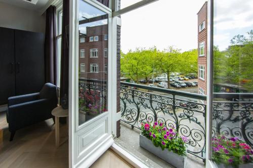 a balcony with a view of a city at No. 377 House in Amsterdam