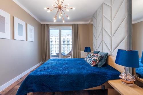 Posteľ alebo postele v izbe v ubytovaní Apartament Golden Rose