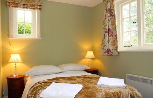 Ένα ή περισσότερα κρεβάτια σε δωμάτιο στο Henley Hall, Ludlow