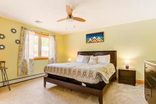 a bedroom with a bed and a ceiling fan at Bear Village 14 in Bartlett