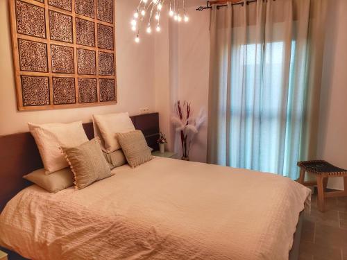 A bed or beds in a room at Santiago Sur, Camino Portugués