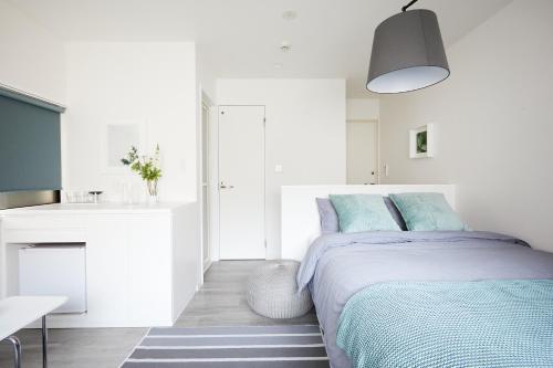 Postel nebo postele na pokoji v ubytování Designers Hotel Siesta