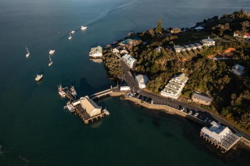 an aerial view of a harbor with boats in the water at Mangonui Motel in Mangonui
