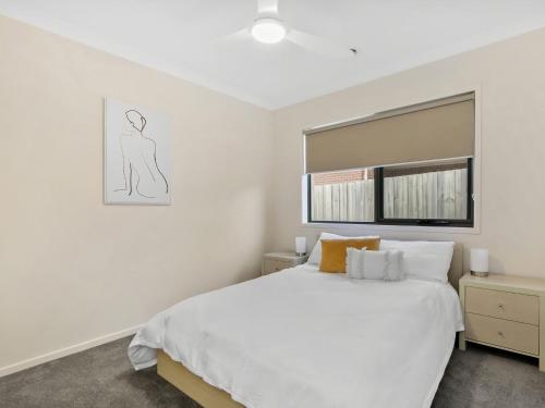 Katil atau katil-katil dalam bilik di Ocean View Crescent 59