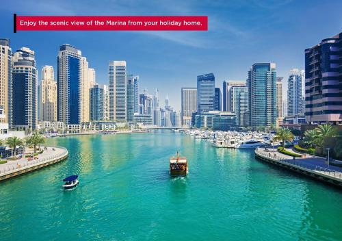 a large body of water with a city at Ramada Hotel and Suites by Wyndham Dubai JBR in Dubai