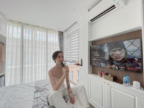 TV a/nebo společenská místnost v ubytování Opera House Suites