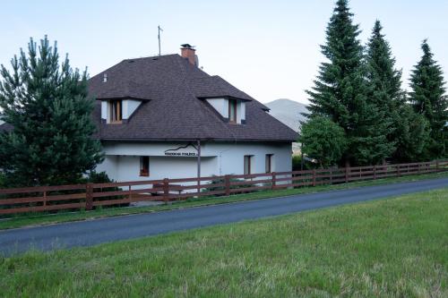 a house on the side of a road at Penzion Na Vyhlídce in Frýdlant nad Ostravicí