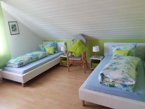 מיטה או מיטות בחדר ב-Ferienwohnung Sigrid