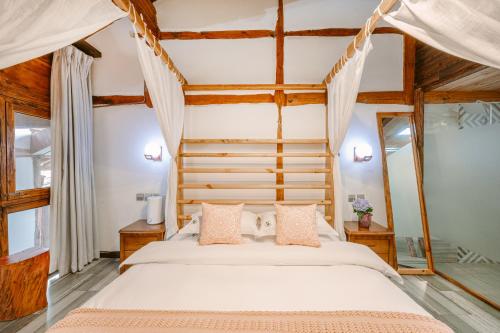 Postel nebo postele na pokoji v ubytování Chunjian Guesthouse