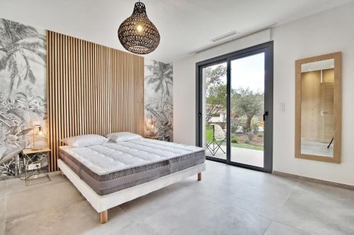 Postel nebo postele na pokoji v ubytování L'Alivetu Villa #INDENO