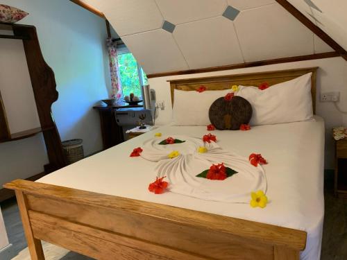 Letto o letti in una camera di Island Bungalow