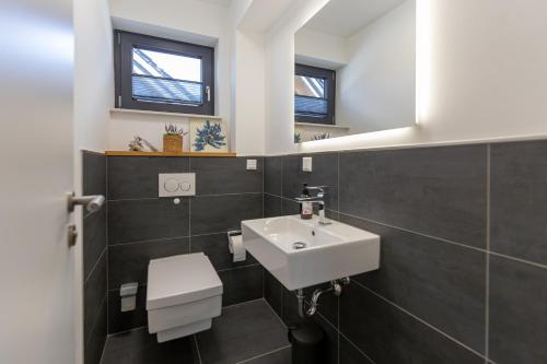 Ένα μπάνιο στο Südstrandquartier - Ferienwohnung Mare