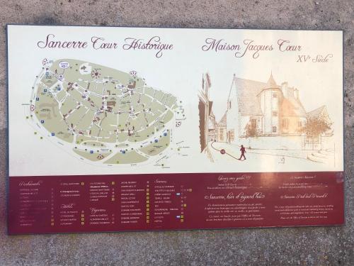 a brochure for a cancer care facility at Appartement centre historique Sancerre in Sancerre