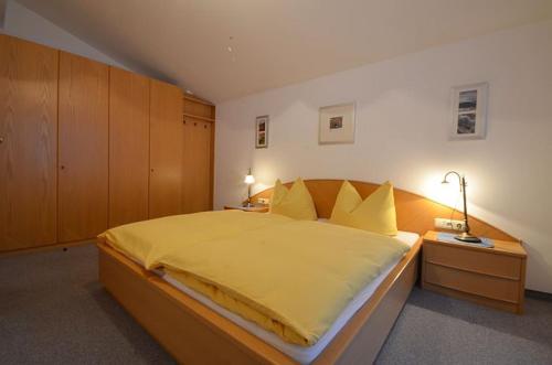 Postel nebo postele na pokoji v ubytování Landhaus Mitteregger