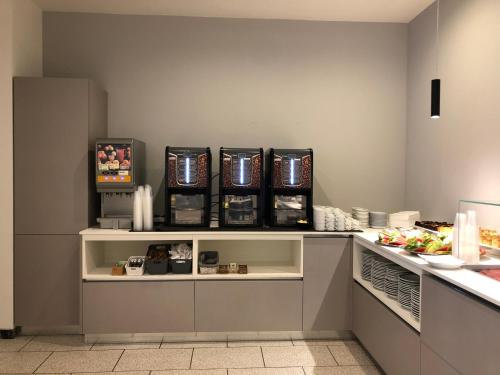 Η κουζίνα ή μικρή κουζίνα στο Hotel ALDEBARAN