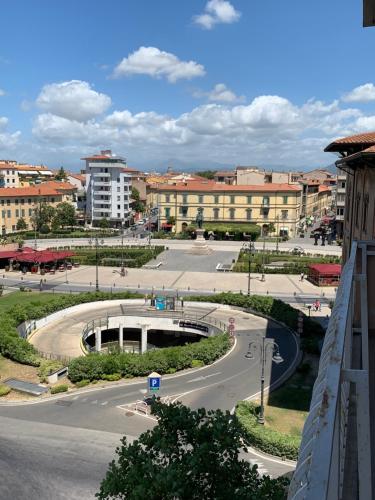 a view of a street in a city with buildings at Pearl Pisa guest house in Pisa