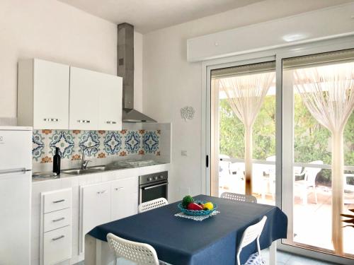 Kuchyň nebo kuchyňský kout v ubytování villino sabbia d'oro