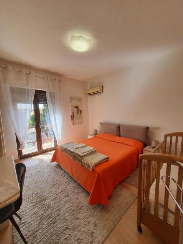 A bed or beds in a room at Sole D'oro IUN S4354
