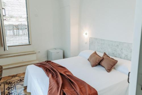 Cama o camas de una habitación en CORTE LARGO LAURO DIMORE & SPA