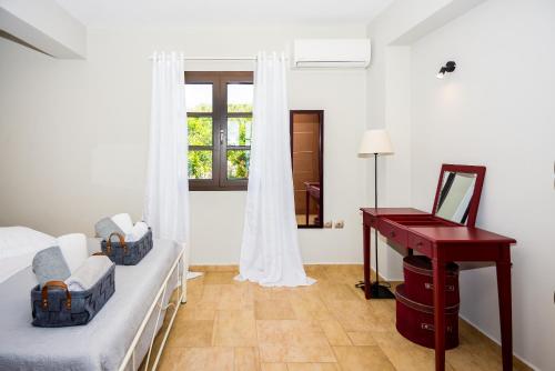 Posezení v ubytování Filon Ktima Beachfront Upscale Villa
