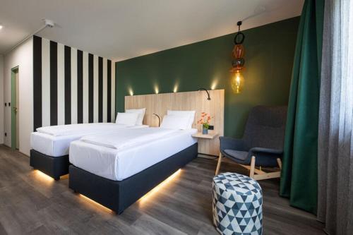 Katil atau katil-katil dalam bilik di ACHAT Hotel Reilingen Walldorf