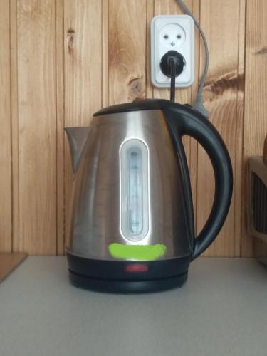 a tea kettle sitting on top of a counter at Садиба "У стрийка" Сопіт in Sopot