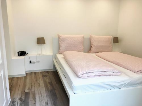 Łóżko lub łóżka w pokoju w obiekcie Gemütlich und Zentral in Boppard