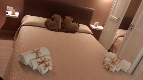 Postel nebo postele na pokoji v ubytování Dimora dei Veneziani