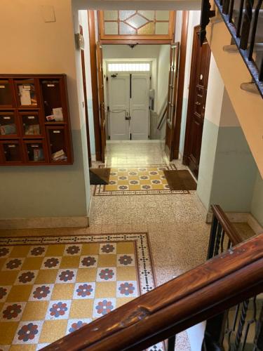 a view of a hallway with a tile floor at Edo apartament in Lido di Ostia