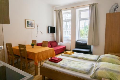 Posteľ alebo postele v izbe v ubytovaní Apartments Hellwagstraße